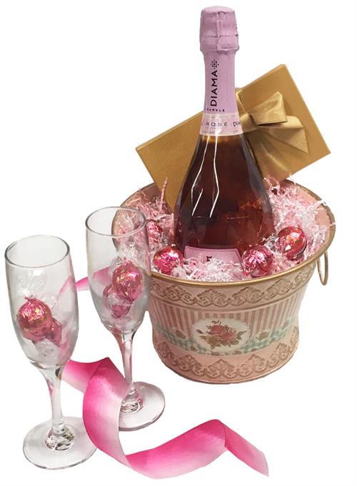 A bottle of crisp, luscious Rose', chocolates and glasses in our Floral Vintage Chic ice bucket