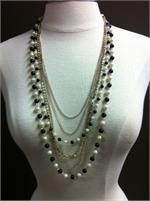 7 strands of pearls, crystals, chains and rhinestones